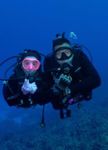 Maxi and Jimmy Romero deep sea diving